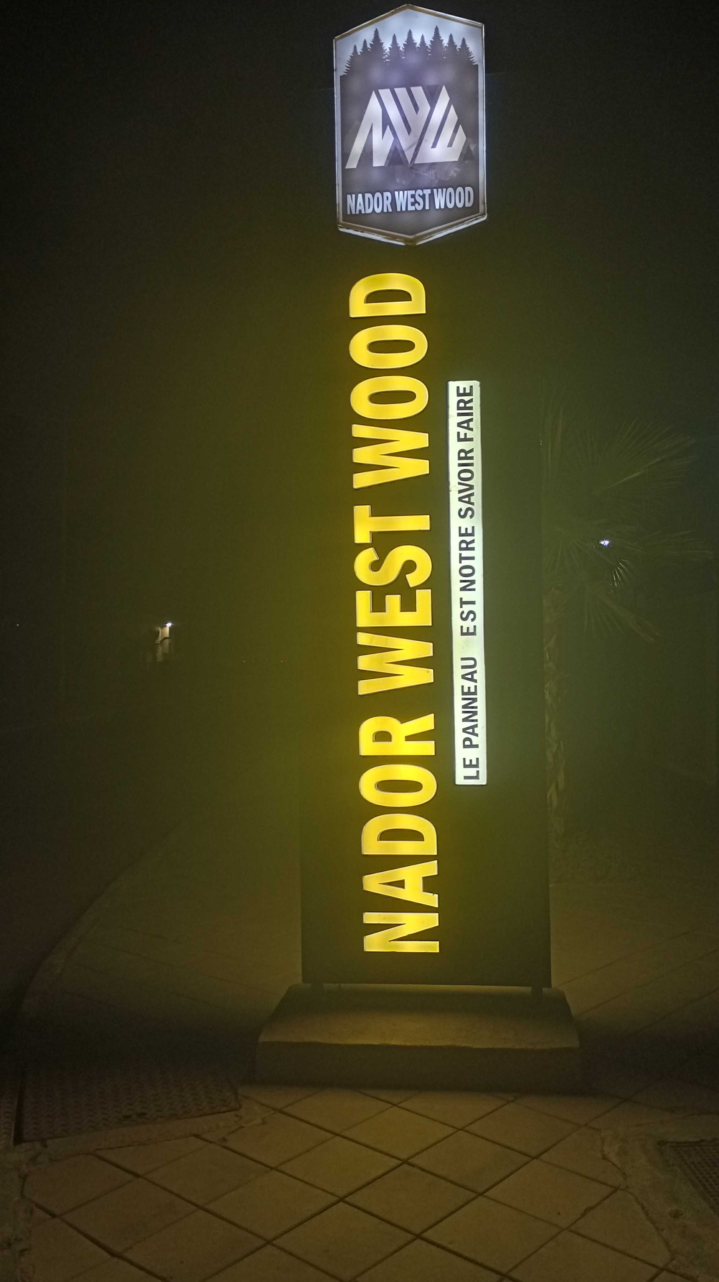 Nador West Wood panel with lights on